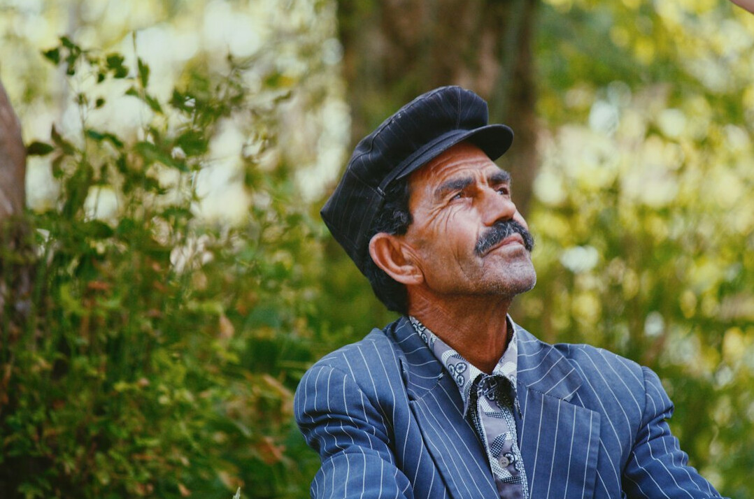 Photographer interviewing a local resident outdoors